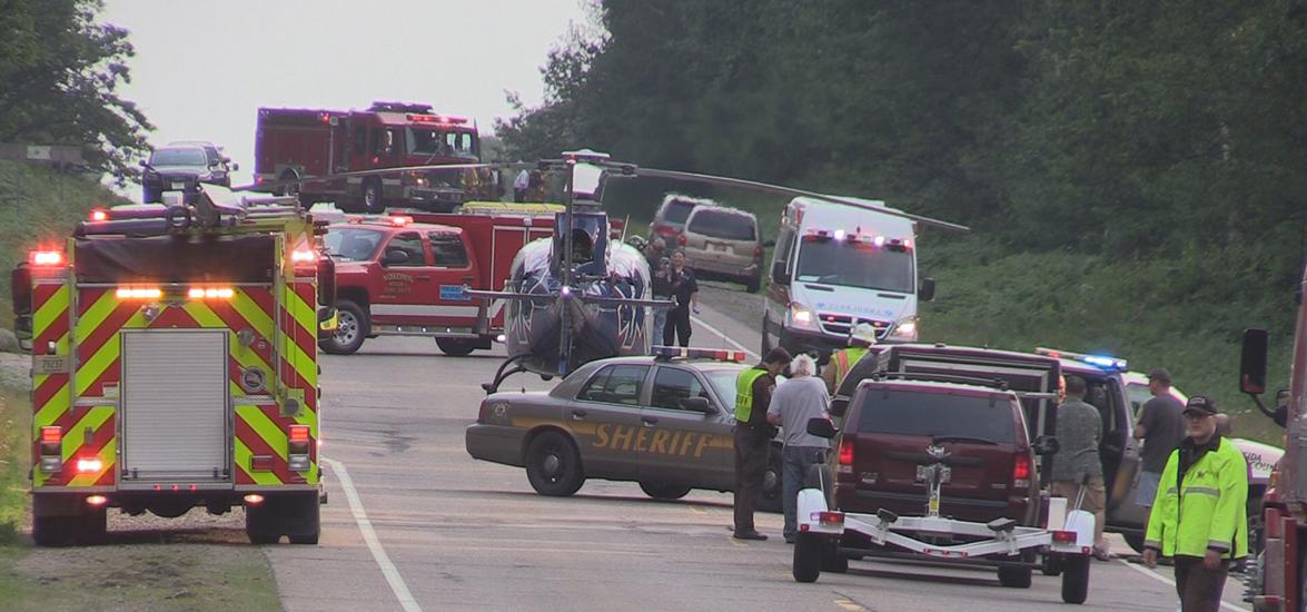 Emergency services personnel respond to a traffic crash.