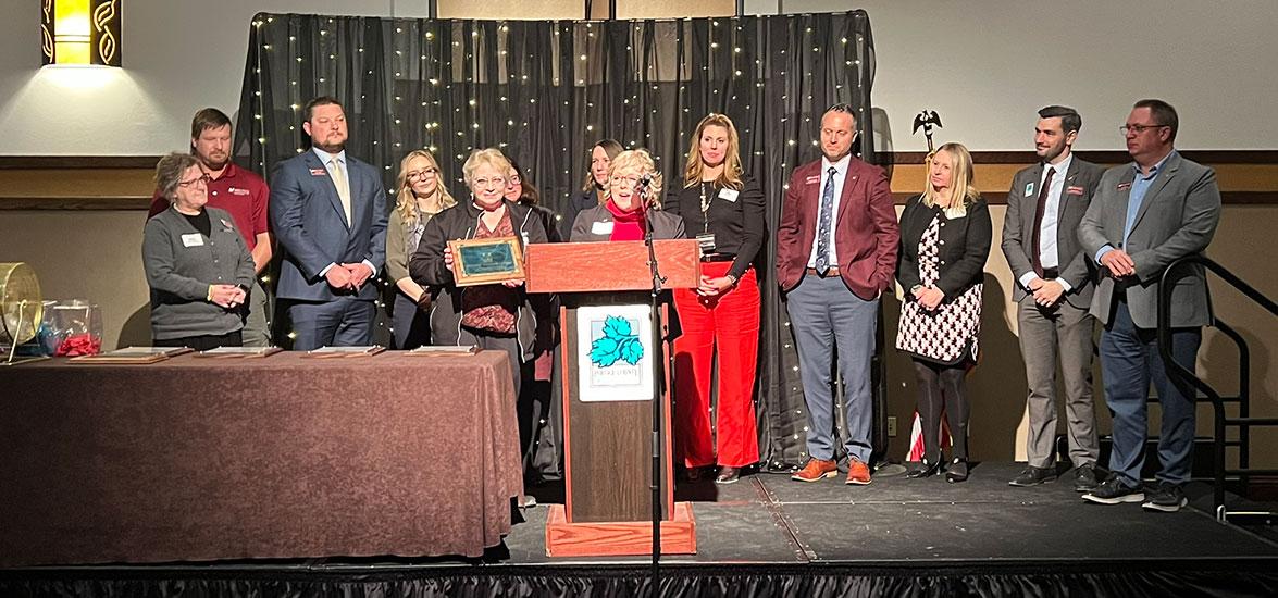 Mid-State Technical College President Dr. Shelly Mondeik accepts the 2024 Portage County Business Council Decree of Excellence award on behalf of the College, at the Holiday Inn Hotel & Convention Center in Stevens Point, Jan. 23.