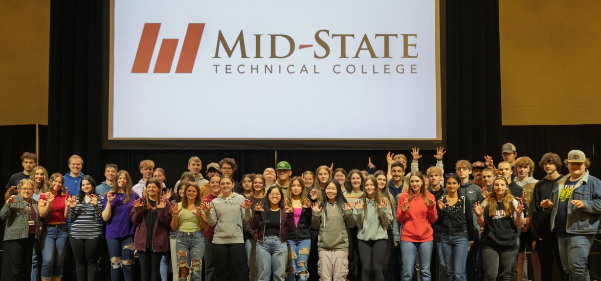 Admit Day attendees who have committed to attending Mid-State upon graduating from high school, on May 1 on the Wisconsin Rapids Campus with President Dr. Shelly Mondeik.