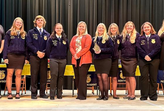 Dr. Alex Lendved (center), Mid-State Technical College dean of the Marshfield Campus and agriculture programs, presents the Chapter of Excellence Award to the Stanley-Boyd FFA chapter at Stanley-Boyd High School’s annual FFA Awards Banquet, May 6.