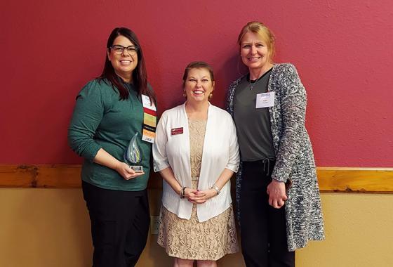 Julie Larsen accepts the Spirit of Wisconsin Health Information Management Association (WHIMA) Award, May 17. From left: Julie Larsen, Mid-State instructor and program director, Health Information Management; Dr. Colleen Kane, dean of the School of Health and the School of Protective & Human Services; Angela Voight, instructor, Health Information Management.
