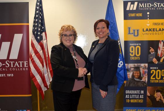 Mid-State Technical College President Dr. Shelly Mondeik (left) and Lakeland University President Dr. Beth Borgen (right) at the Mid-State and Lakeland expanded collaboration celebration event on Mid-State’s Marshfield Campus on Wednesday, Nov. 15.