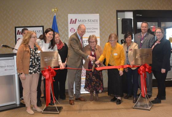 Cutting the ribbon at Mid-State’s new location in Marshfield Clinic.