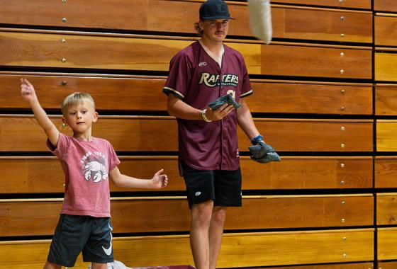 A “Rafters Meet-and-Greet” attendee competes in the Cornhole challenge against a Rafters player at the 2024 event held on Mid-State’s Wisconsin Rapids Campus. This year’s event will be held on June 11.