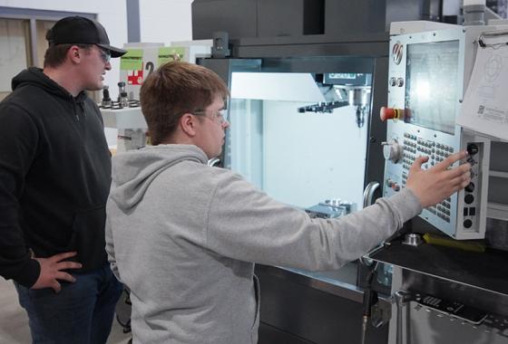Students operate a CNC machine in Mid-State Technical College’s AMETA Center.