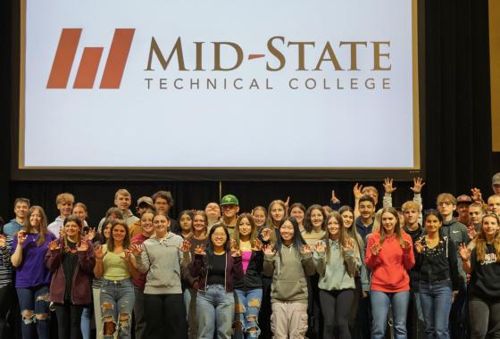 Admit Day attendees who have committed to attending Mid-State upon graduating from high school, on May 1 on the Wisconsin Rapids Campus with President Dr. Shelly Mondeik.